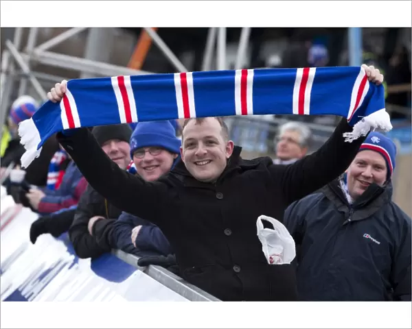 Rangers Triumph: A Sea of Supporters Celebrating at Balmoor Stadium (1-0 vs Peterhead, Scottish Third Division)