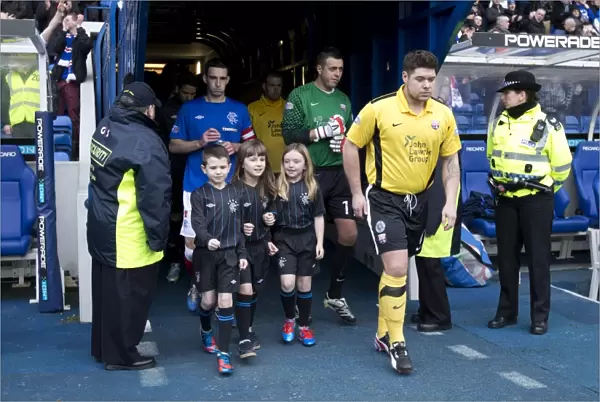 Lee Wallace and Rangers Mascots Kick-Off Scottish Third Division Match at Ibrox Stadium: Rangers vs Montrose (1-1)