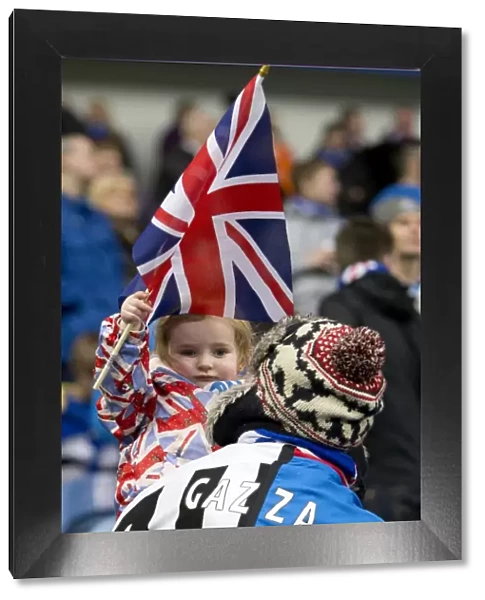 Rangers Fans Unwavering Pride: A 4-0 Victory over Queens Park at Ibrox Stadium with Daughter in Rangers-Newcastle Strip and a Dedicated Fan in Split Loyalties Waving the Union Jack