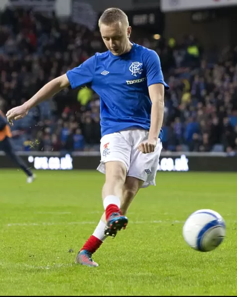 A Rangers Fan's Unforgettable Penalty Kick at Ibrox Stadium: Celebrating a 4-0 Lead in the Scottish Third Division Irn-Bru Cup