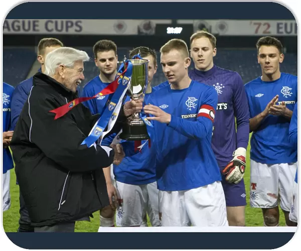 Rangers Reserves Clinch SFL Reserve League Title: Andy Mitchell Receives the Trophy from Lord McFarlane at Ibrox Stadium