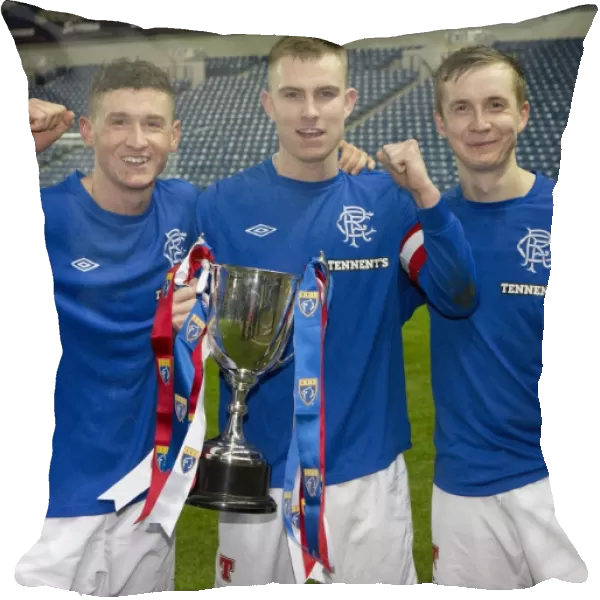Rangers Reserves: Andy Mitchell and Team Celebrate SFL Reserve League Victory with Trophy Lift