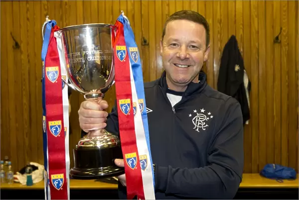 Rangers Reserves Triumph: Tommy Wilson and Team Celebrate SFL Reserve League Victory over Queens Park Reserves (2-0) at Ibrox Stadium