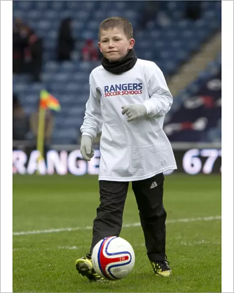 Community Spirit at Ibrox: Half Time Fun with Kids Amidst the Third Division Match - Rangers vs Stirling Albion
