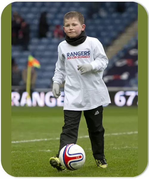 Community Spirit at Ibrox: Half Time Fun with Kids Amidst the Third Division Match - Rangers vs Stirling Albion