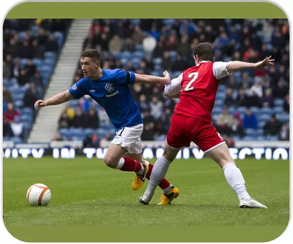 A Scoreless Battle: Fraser Aird vs Jamie McCunnie at Ibrox Stadium - Rangers vs Stirling Albion (Scottish Third Division)
