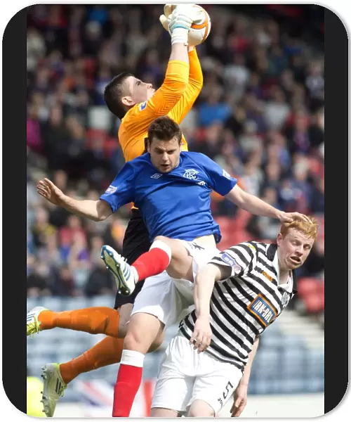 Rangers Faure vs. Parry: Battling for the Ball in Rangers 4-1 Irn-Bru Scottish Third Division Victory at Hampden Stadium