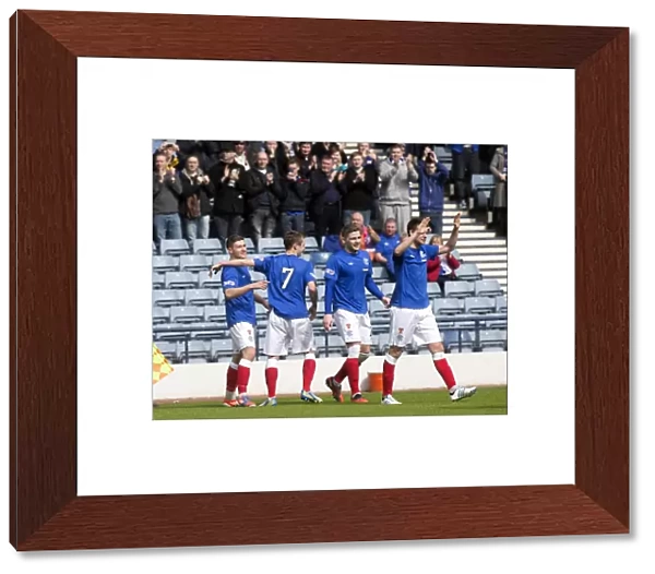 Rangers Glory: Fraser Aird and Teammates Celebrate Four-Goal Victory over Queens Park at Hampden Stadium