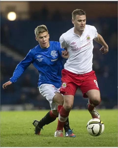 Murdoch and Thompson in Action: Rangers Lead 2-0 vs Linfield at Ibrox Stadium