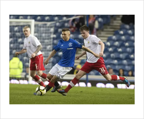 Rangers Charlie Telfer in Action: 2-0 Lead over Linfield at Ibrox Stadium