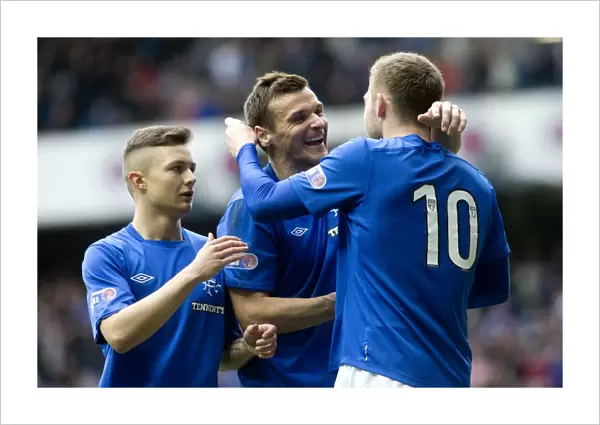 Rangers Kyle Hutton and Teammates: Double Delight - Celebrating Goals 1 and 2 in a Dominant 2-0 Win Over Clyde at Ibrox Stadium