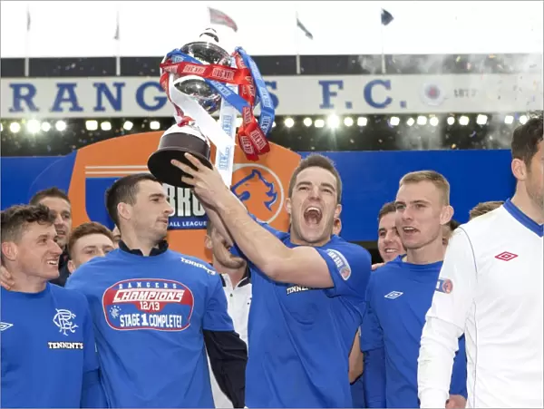 Rangers Football Club: Triumphant Third Division Victory - Andy Little Lifts the Irn Bru Trophy at Ibrox Stadium