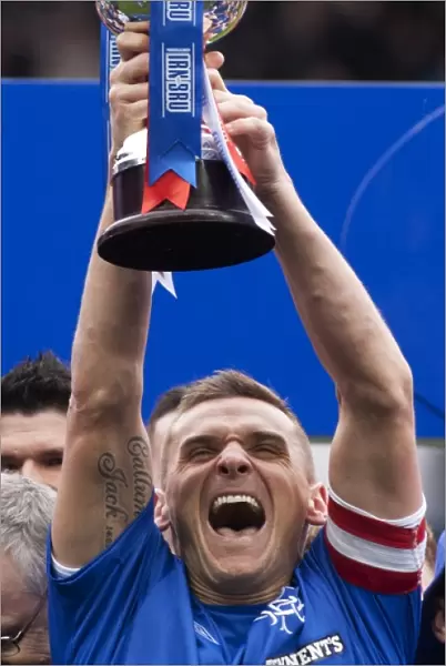 Rangers Football Club: Lee McCulloch's Triumphant Irn Bru Trophy Lift at Ibrox Stadium - Promotion to Third Division