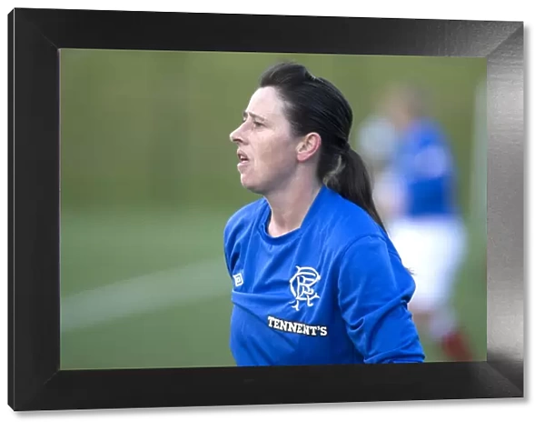 Intense Rivalry: Karen Penglase of Rangers Ladies Faces Off Against Hibernian Ladies in Scottish Women's Premier League Soccer Match