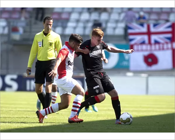 Rangers Lewis Macleod Fights for Ball in Intense FC Emmen vs Rangers Soccer Match (0-1)