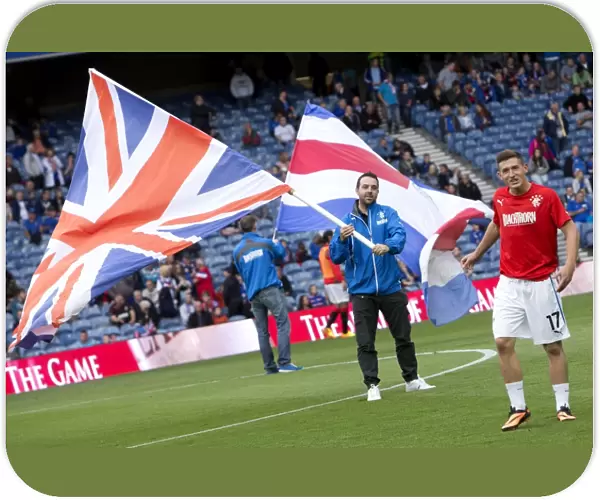 Rangers vs Newcastle United: Flag Bearers in Action - A 1-1 Draw at Ibrox Stadium