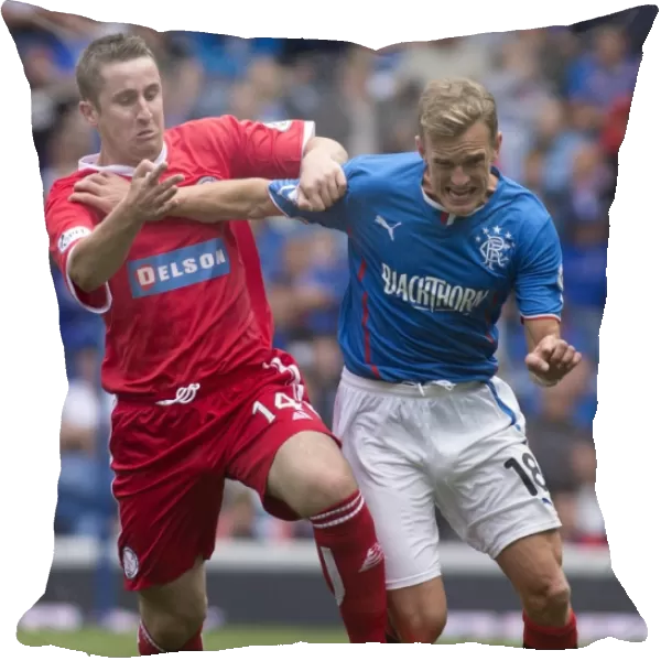 Intense Rivalry: A Football Battle Epitomized - Dean Shiels vs Greg Cameron at Ibrox Stadium (Rangers 4-1 Brechin City)