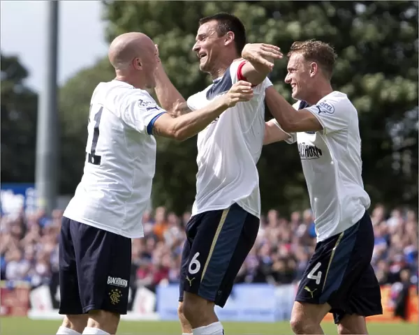 Rangers Triumph: Lee McCulloch and Team Mates Celebrate Three Goals in Scottish League One (Stranraer 0-3 Rangers)