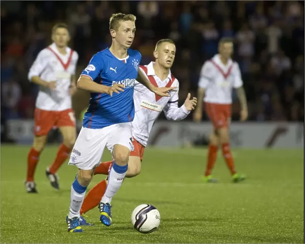 Robbie Crawford in Action: Rangers Dominance over Airdrieonians in Scottish League One (6-0)