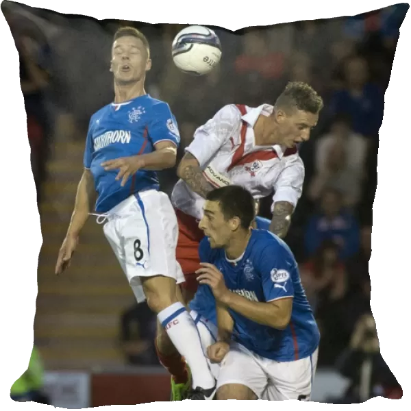 Rangers Ian Black Fights for a Header: Dominating Airdrieonians 6-0 in Scottish League One