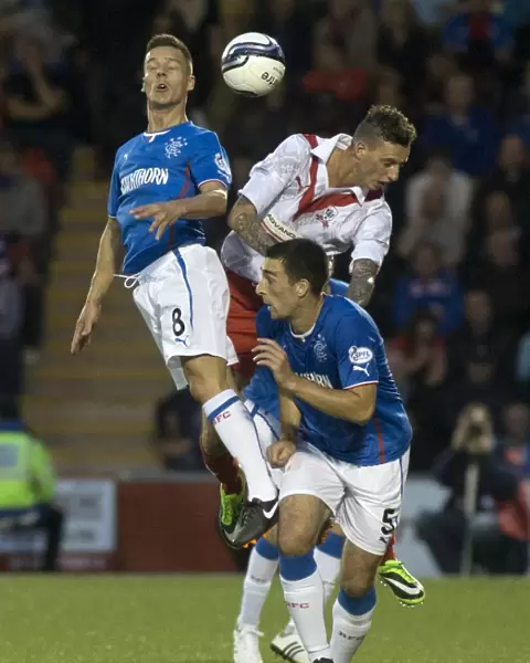 Rangers Ian Black Fights for a Header: Dominating Airdrieonians 6-0 in Scottish League One