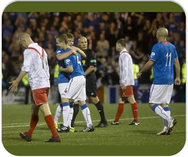 Rangers Robbie Crawford and Lewis Macleod: A Celebratory Moment in Rangers 6-0 Victory over Airdrieonians