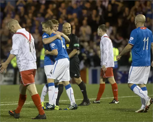 Rangers Robbie Crawford and Lewis Macleod: A Celebratory Moment in Rangers 6-0 Victory over Airdrieonians