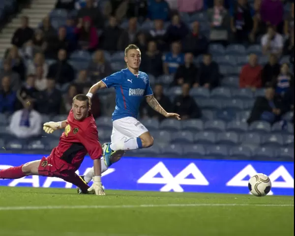 Rangers Take Early Lead: Barrie McKay Scores Stunner at Ibrox (2-0)