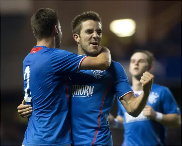 Rangers Celebrate: Andy Little and Sebastien Faure's Goals Secure 2-0 Victory Over Berwick Rangers at Ibrox Stadium