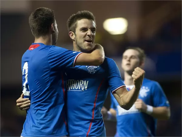Rangers Celebrate: Andy Little and Sebastien Faure's Goals Secure 2-0 Victory Over Berwick Rangers at Ibrox Stadium
