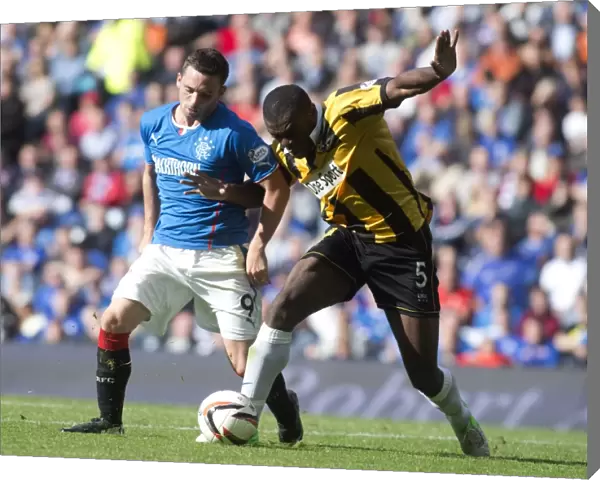 Rangers Dominance: Nicky Clark vs Joe Mbu in Intense Clash during Rangers 5-0 Thriller against East Fife (Ibrox Stadium)