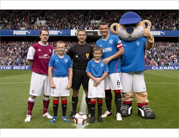 Rangers Football Club: Lee McCulloch and Mascots Celebrate Thrilling 5-1 Victory over Arbroath at Ibrox Stadium
