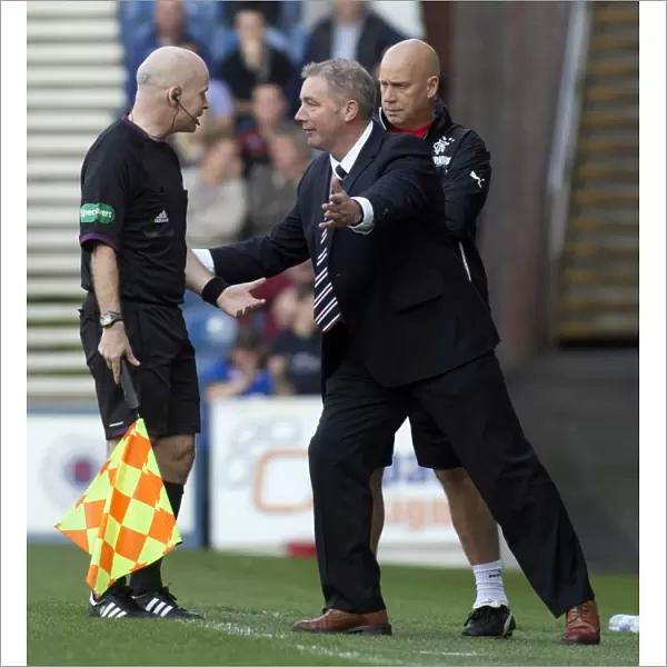 Rangers Ally McCoist Discusses Calls with Linesman during Rangers vs Stenhousemuir Match