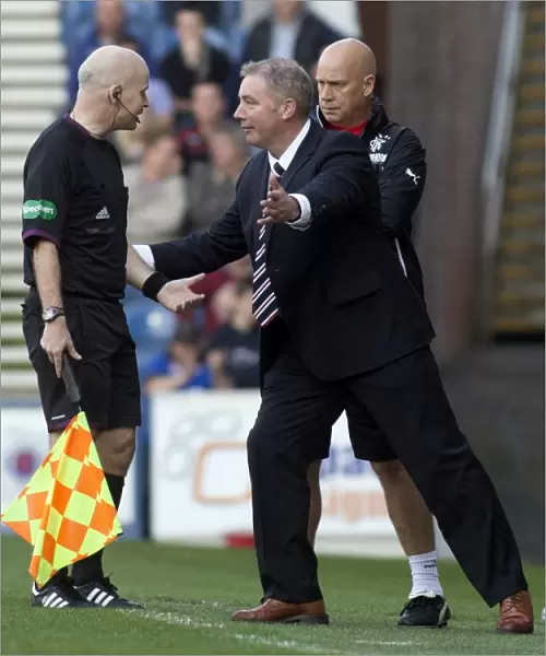 Rangers Ally McCoist Discusses Calls with Linesman during Rangers vs Stenhousemuir Match