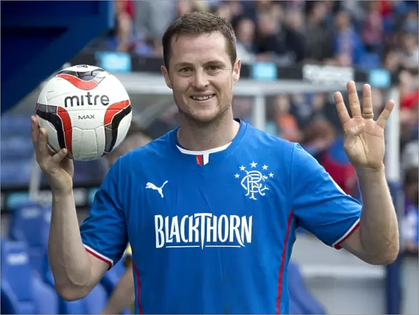 Rangers Jon Daly: Rejoicing with Pride and the Historic Match Ball after Rangers 8-0 Victory over Stenhousemuir at Ibrox Stadium