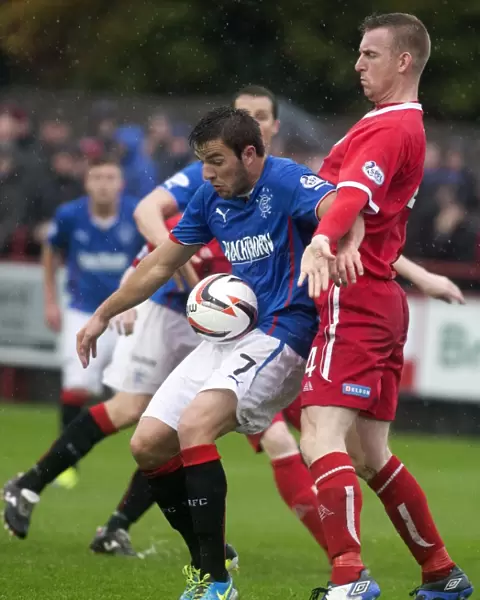 Thrilling Comeback: Rangers Andy Little Scores Dramatic 3-4 Victory Over Brechin City's Graeme Hay in SPFL League 1 at Glebe Park