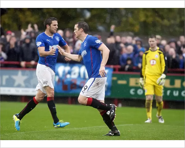 Rangers Jon Daly and Andy Little: Celebrating Goals in Thrilling 3-4 Victory over Brechin City (SPFL League 1)