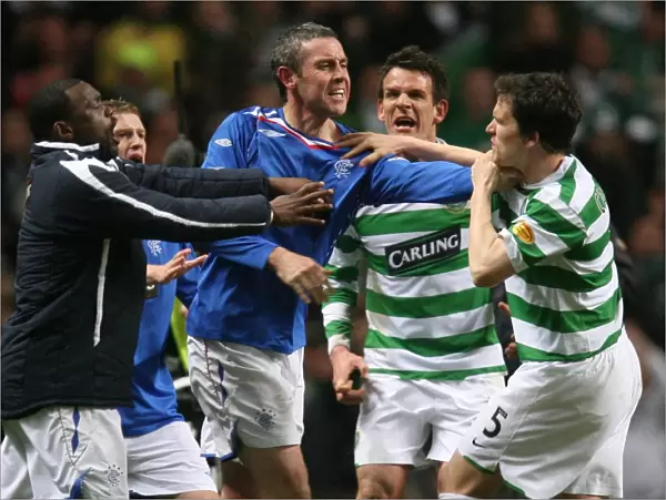 A Bittersweet End: David Weir and Gary Caldwell at the Final Whistle - Celtic vs Rangers (2-1 in favor of Celtic)