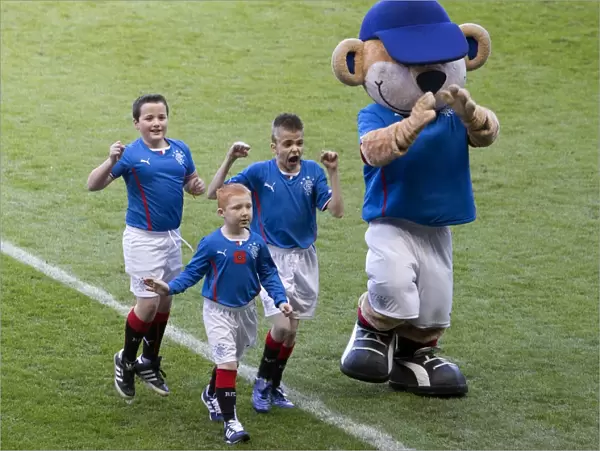 Rangers Football Club: Thrilling Celebration as Mascots and Broxi Bear Reunite at Ibrox Stadium during Rangers vs Airdrieonians Match