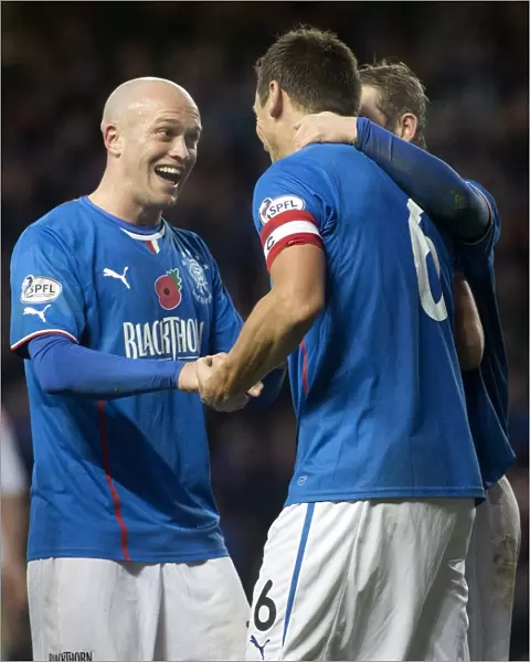Rangers McCulloch and Law: Celebrating a Goal in SPFL League 1 at Ibrox Stadium