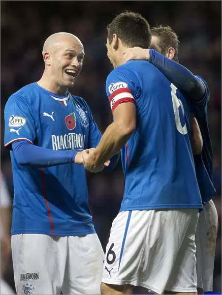 Rangers McCulloch and Law: Celebrating a Goal in SPFL League 1 at Ibrox Stadium