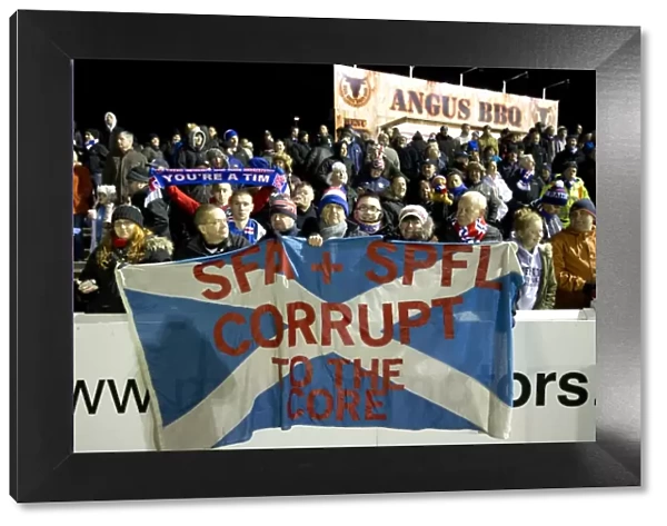 Triumphant Roar: Rangers Football Club Fans Celebrate Scottish Cup Victory at Arbroath's Gayfield Park (2003)