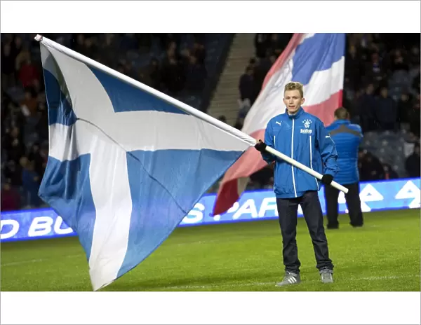 Scottish Cup Triumph: Rangers Flag Bearer's Jubilant Celebration at Ibrox Stadium (2003)