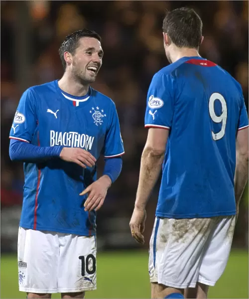 A Lighthearted Moment: Nicky Clark and Jon Daly Share a Laugh at East End Park