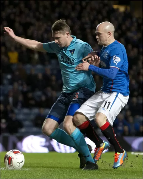 Law vs Morris: Intense Rivalry in the 2014 Scottish Cup Clash between Rangers and Dunfermline Athletic at Ibrox