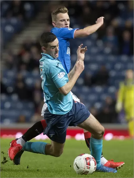 Intense Rivalry: Shiels vs. Martin in the Scottish Cup Clash at Ibrox Stadium