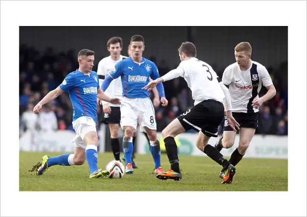 Rangers Fraser Aird Charges Towards Ayr United's Gordon Pope in Intense Scottish League One Clash at Somerset Park