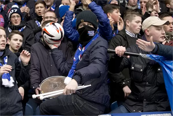 Rangers Football Club: A Fan's Triumphant Moment - Celebrating with the Scottish Cup Match Ball at Ibrox Stadium