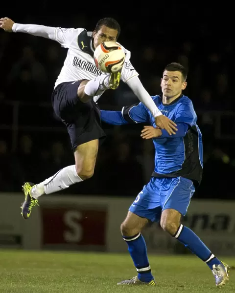 Peralta vs Bell: Intense Moment in Rangers Scottish League One Clash at Stair Park
