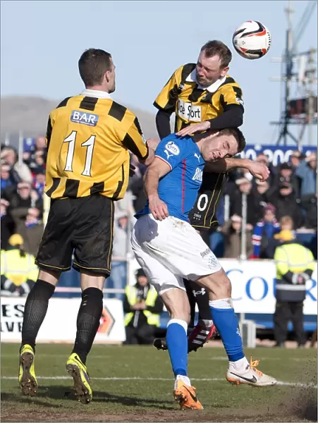 Clash at Bayview Stadium: A Head-to-Head Battle - Rangers vs East Fife in the Scottish Cup (2003)